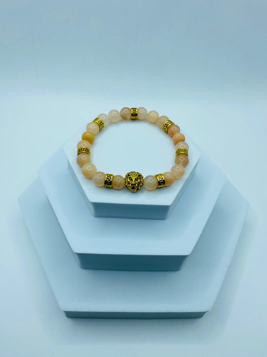 Pink Jade Lion Bracelet: Gold Tibetan Charm Bracelet