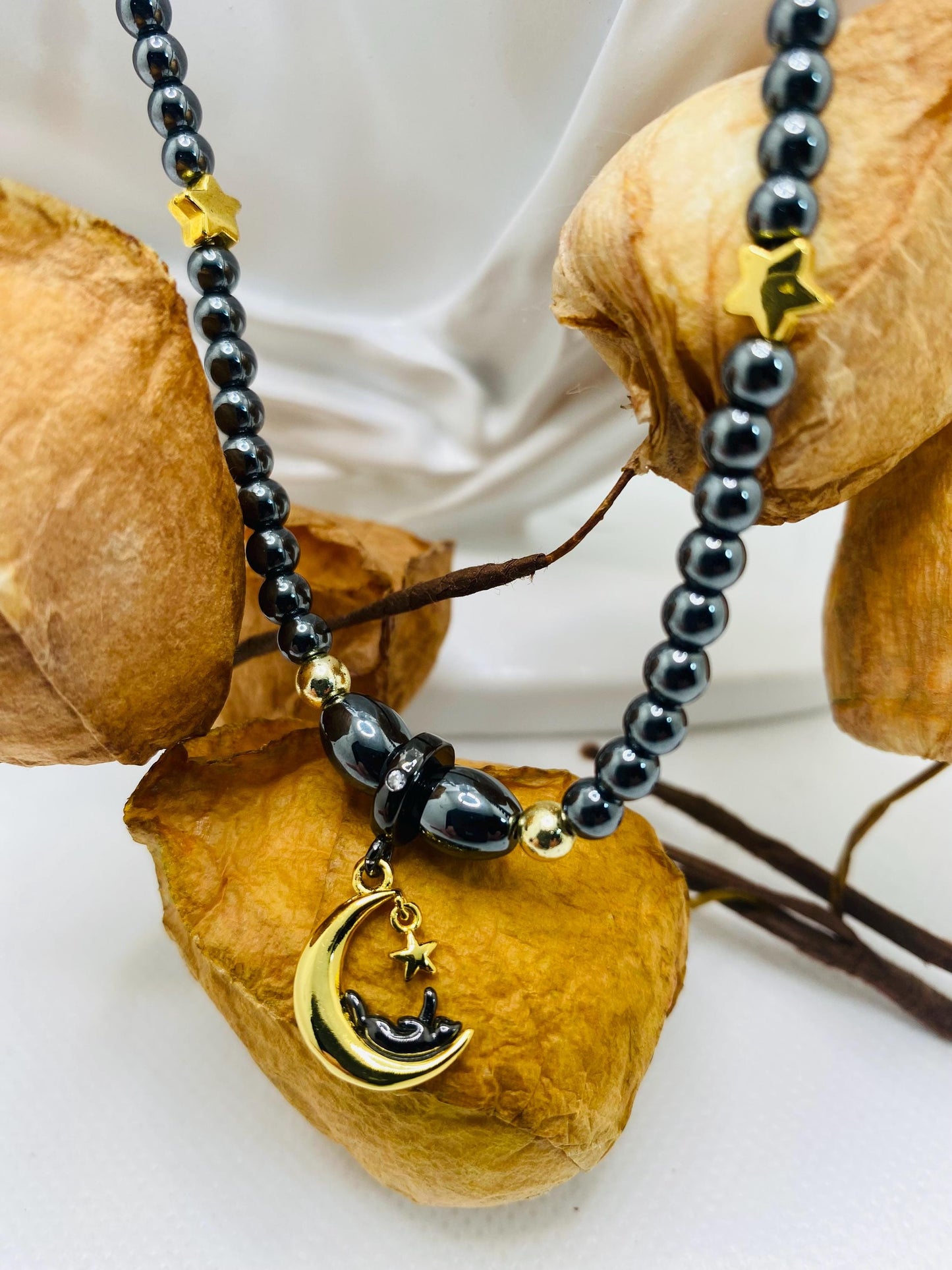 Celestial Hematite Necklace: Gold Star, Moon & Cat Charm