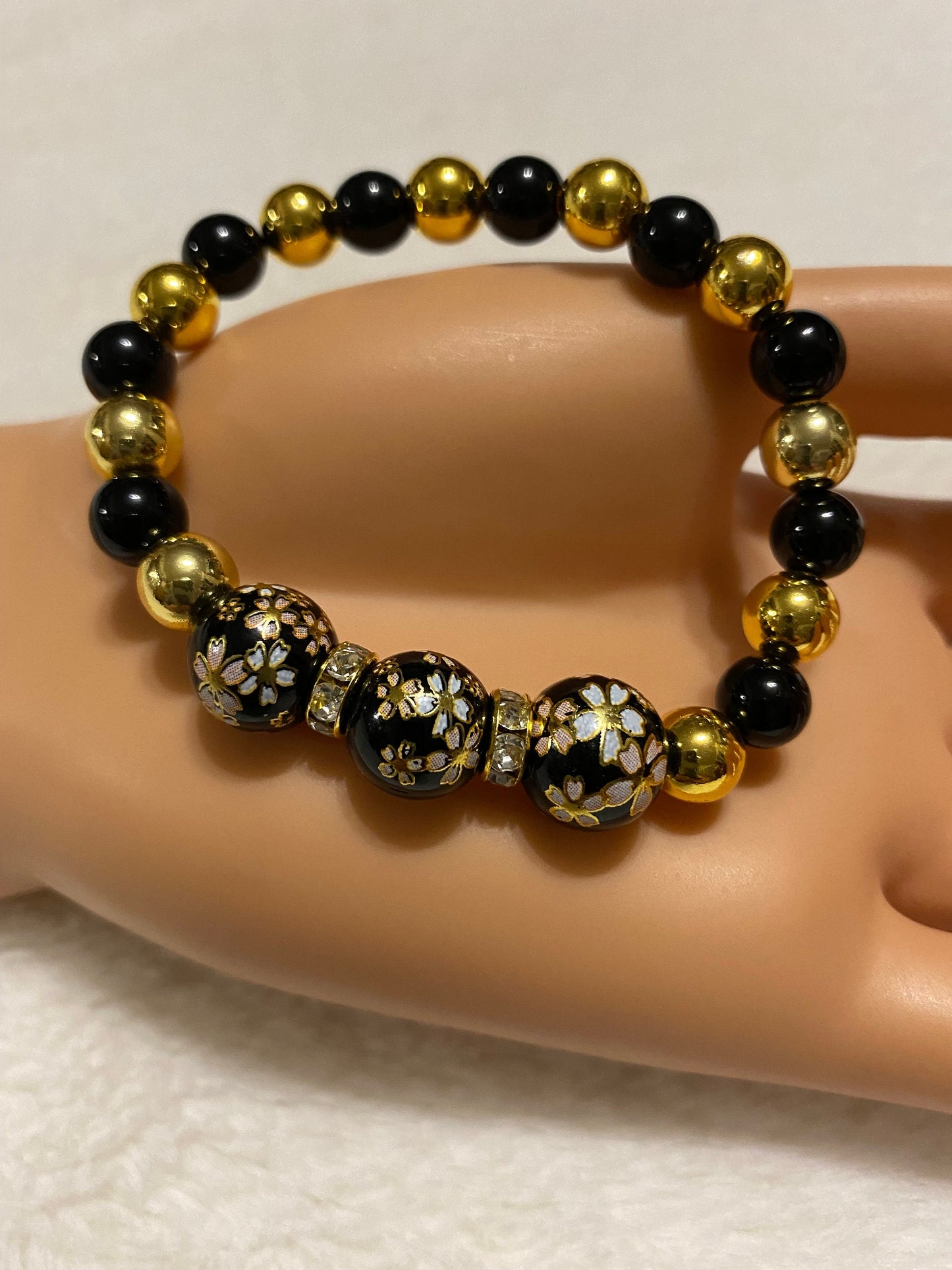 Handmade Floral Painted Glass Bead Bracelet: Onyx & 18k Gold Hematite