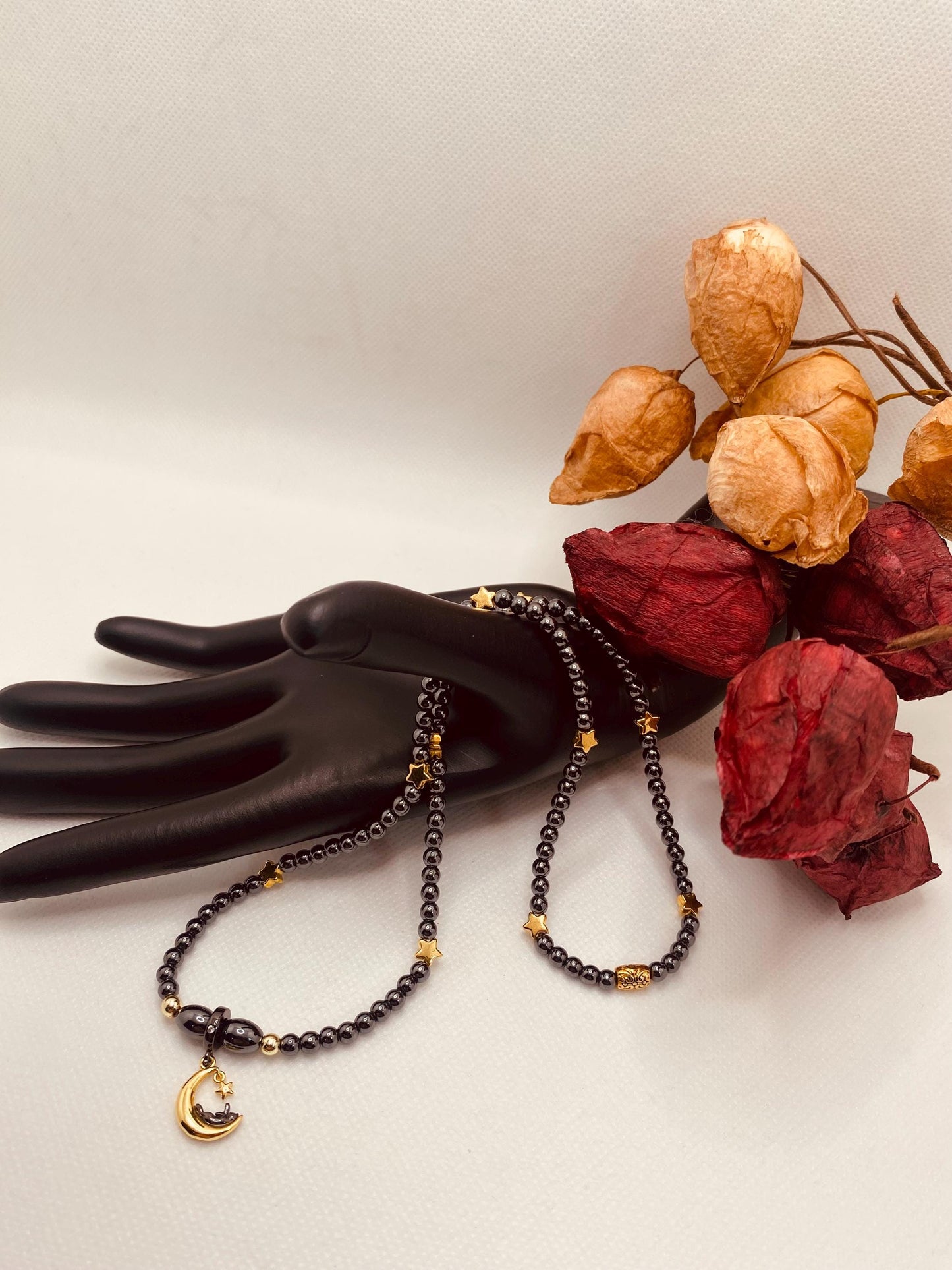 Celestial Hematite Necklace: Gold Star, Moon & Cat Charm