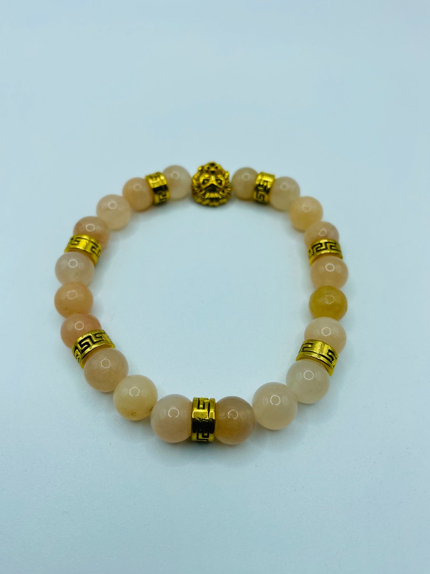 Pink Jade Lion Bracelet: Gold Tibetan Charm Bracelet