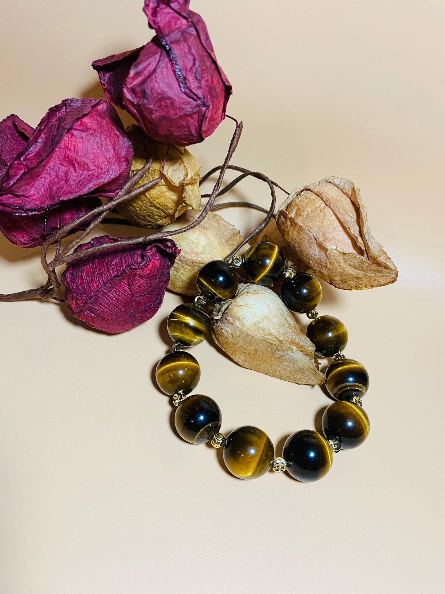 Tigers Eye Gemstone Bracelet: 16mm Beads with Gold Spacers