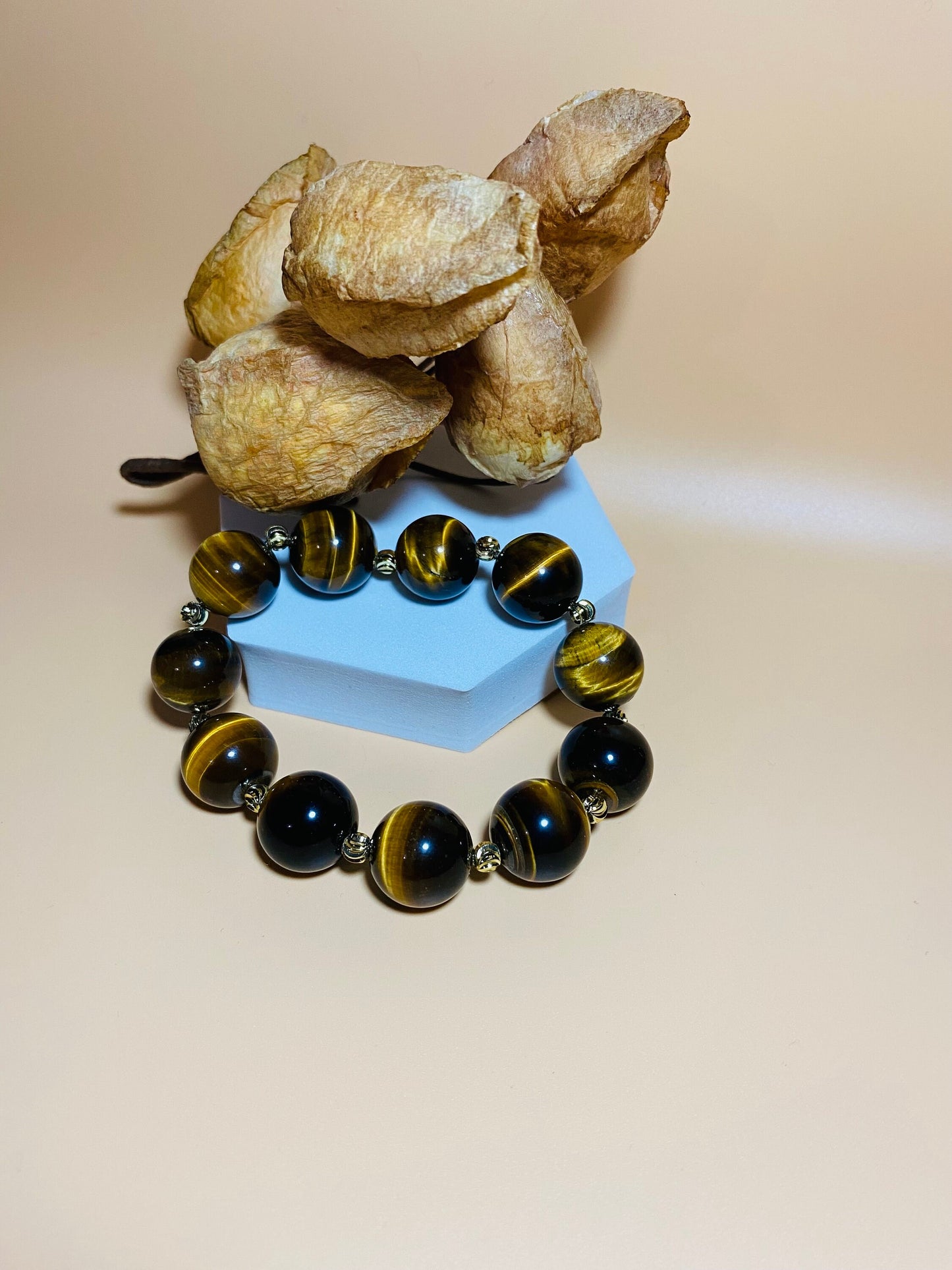 Tigers Eye Gemstone Bracelet: 16mm Beads with Gold Spacers