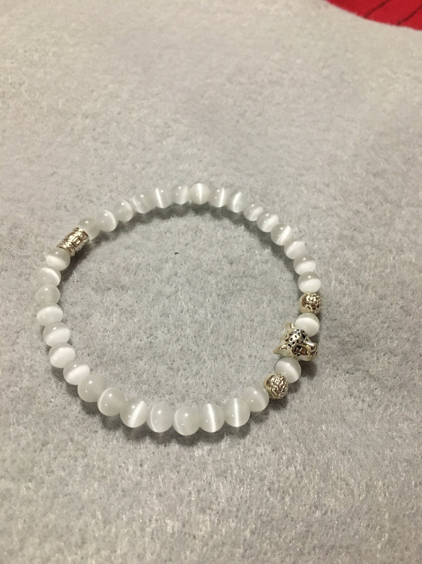 Leopard Charm Bracelet: White Cats Eye Bead, Silver Accents