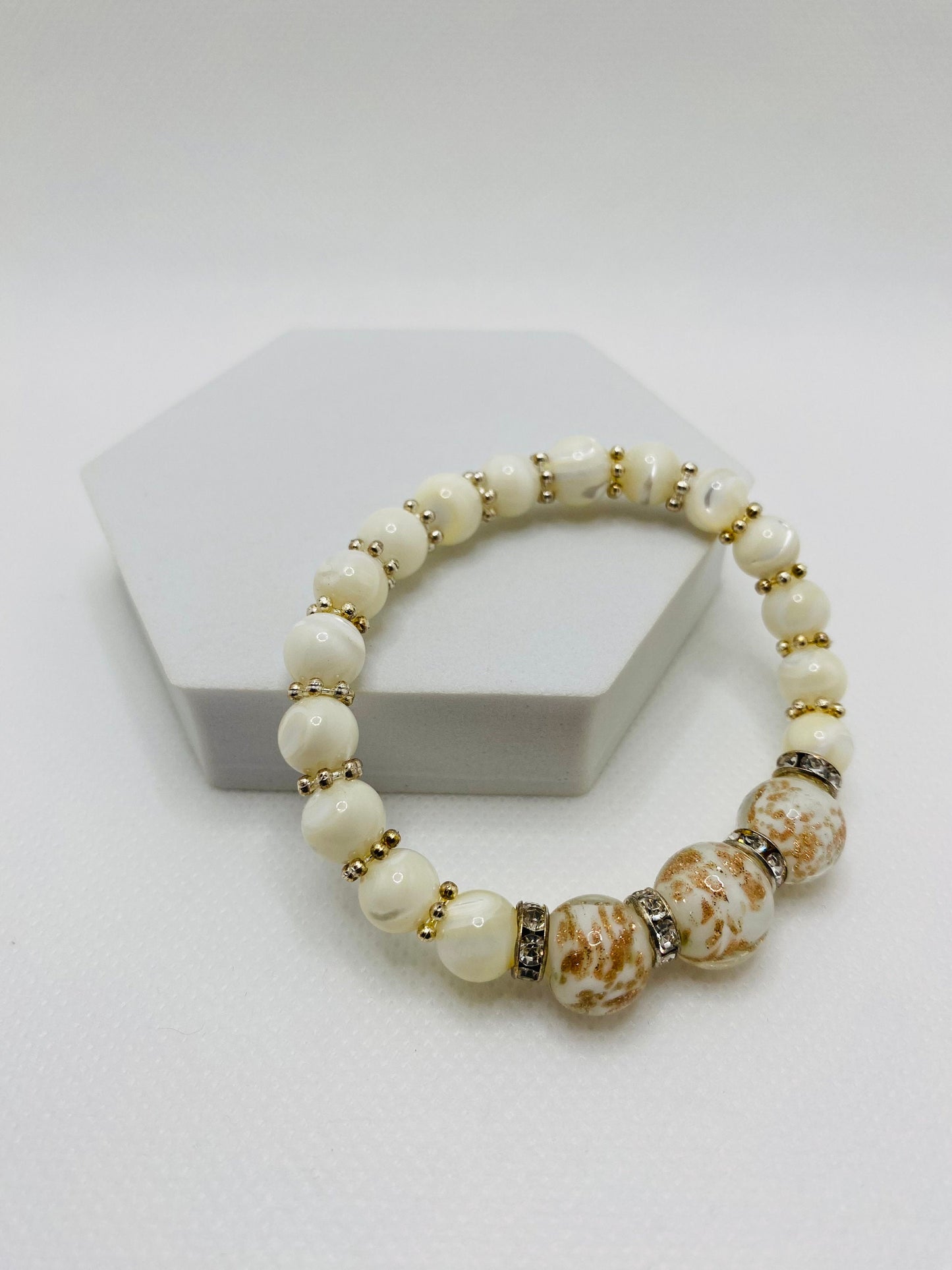 Handmade Mother of Pearl Bracelet: Lampwork Glass Beads, Silver Snowflakes