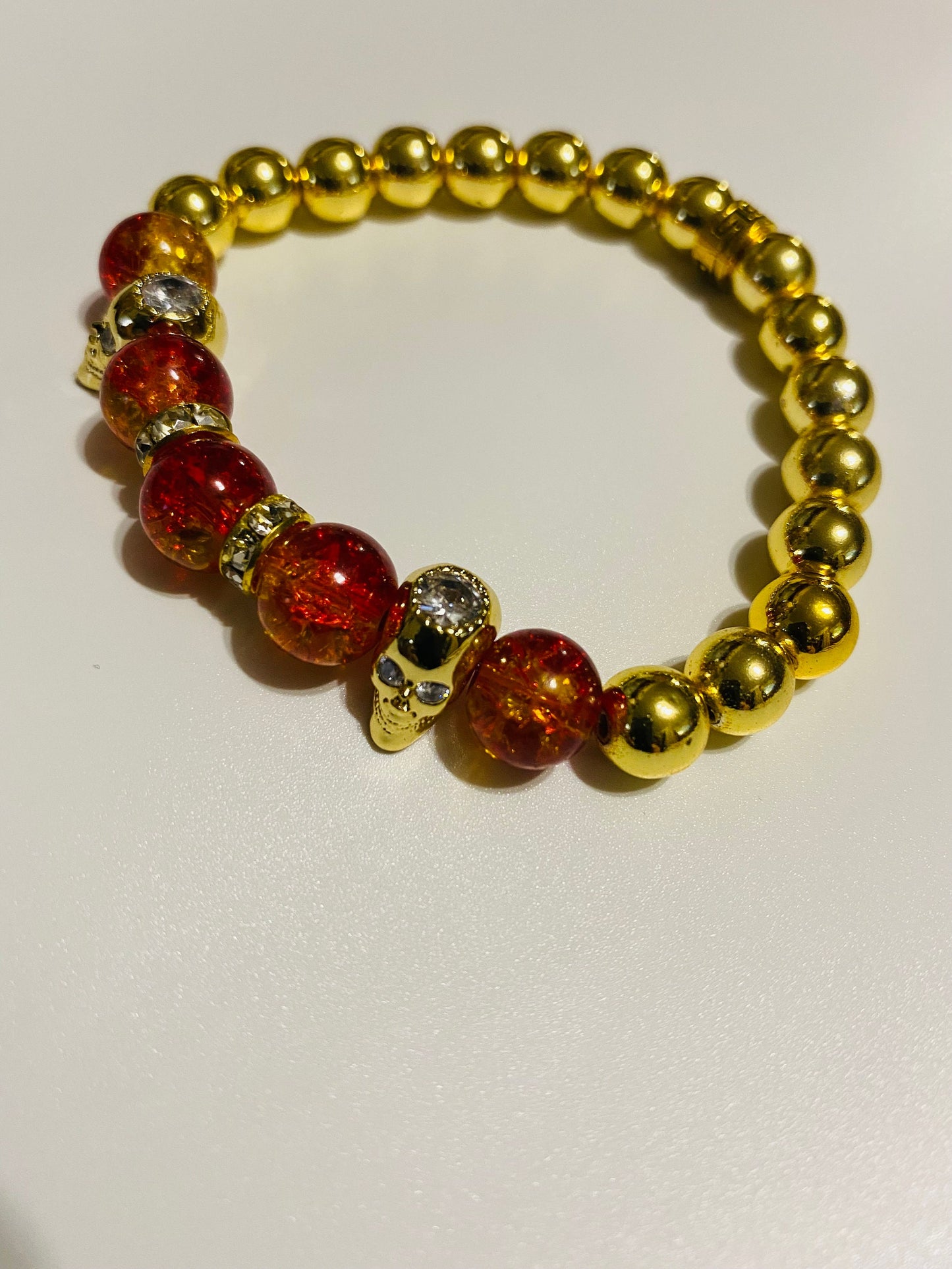 Men's Gold Hematite Bracelet: Red Crystal, CZ Skull Beads