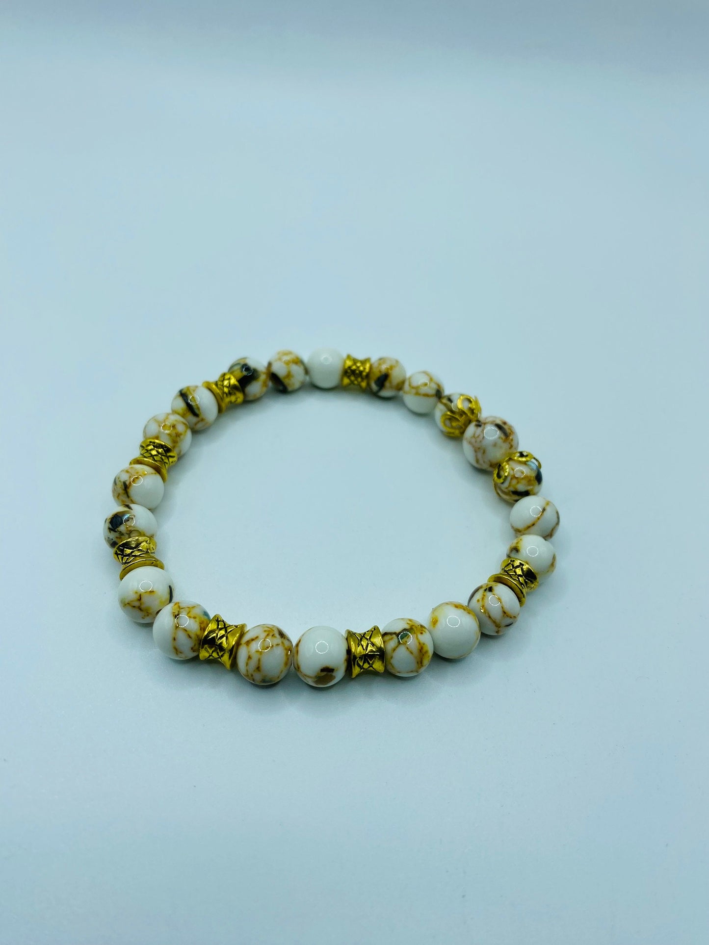 Handmade White Turquoise Bracelet: Tibetan Gold Spacers