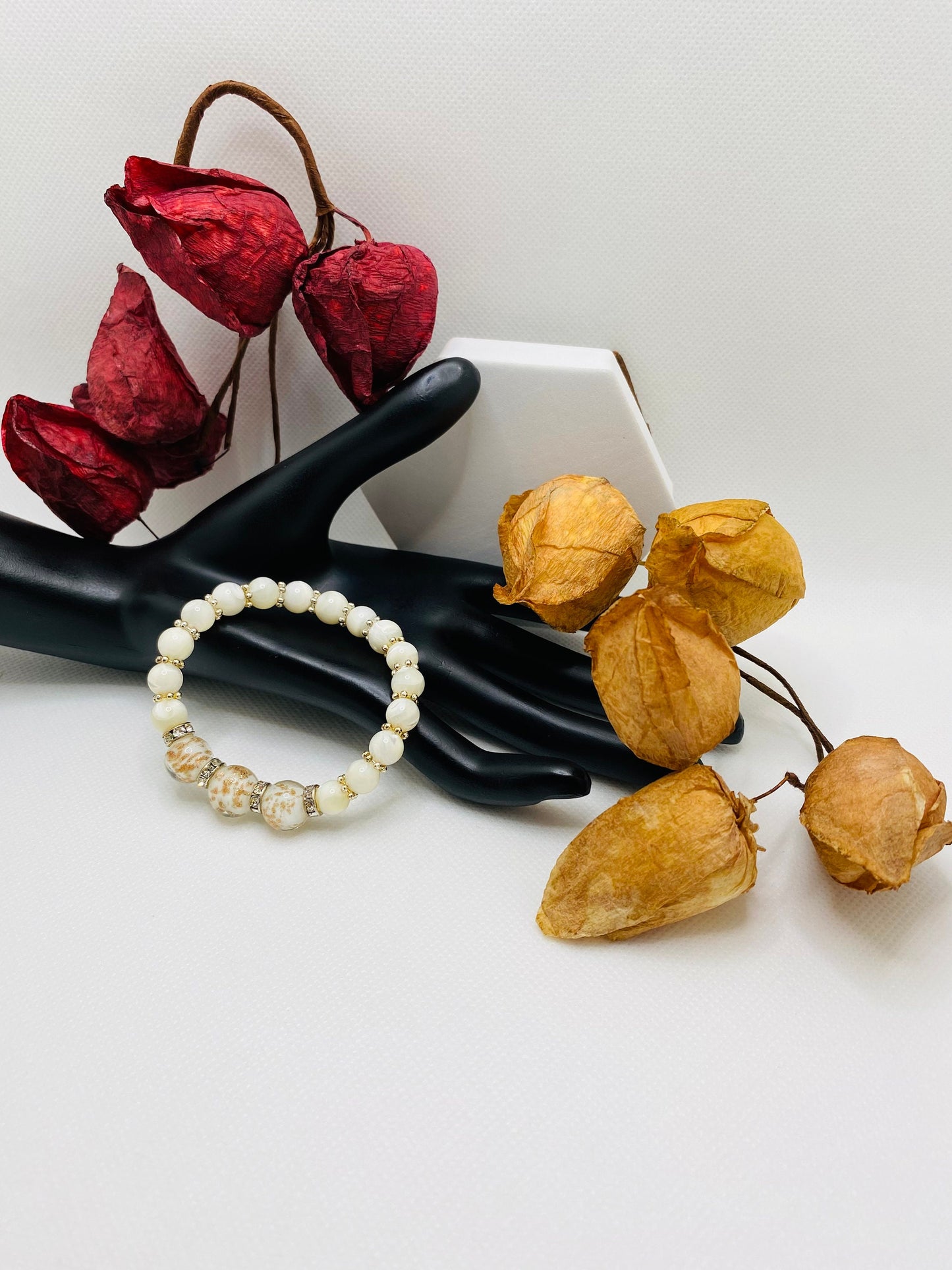 Handmade Mother of Pearl Bracelet: Lampwork Glass Beads, Silver Snowflakes