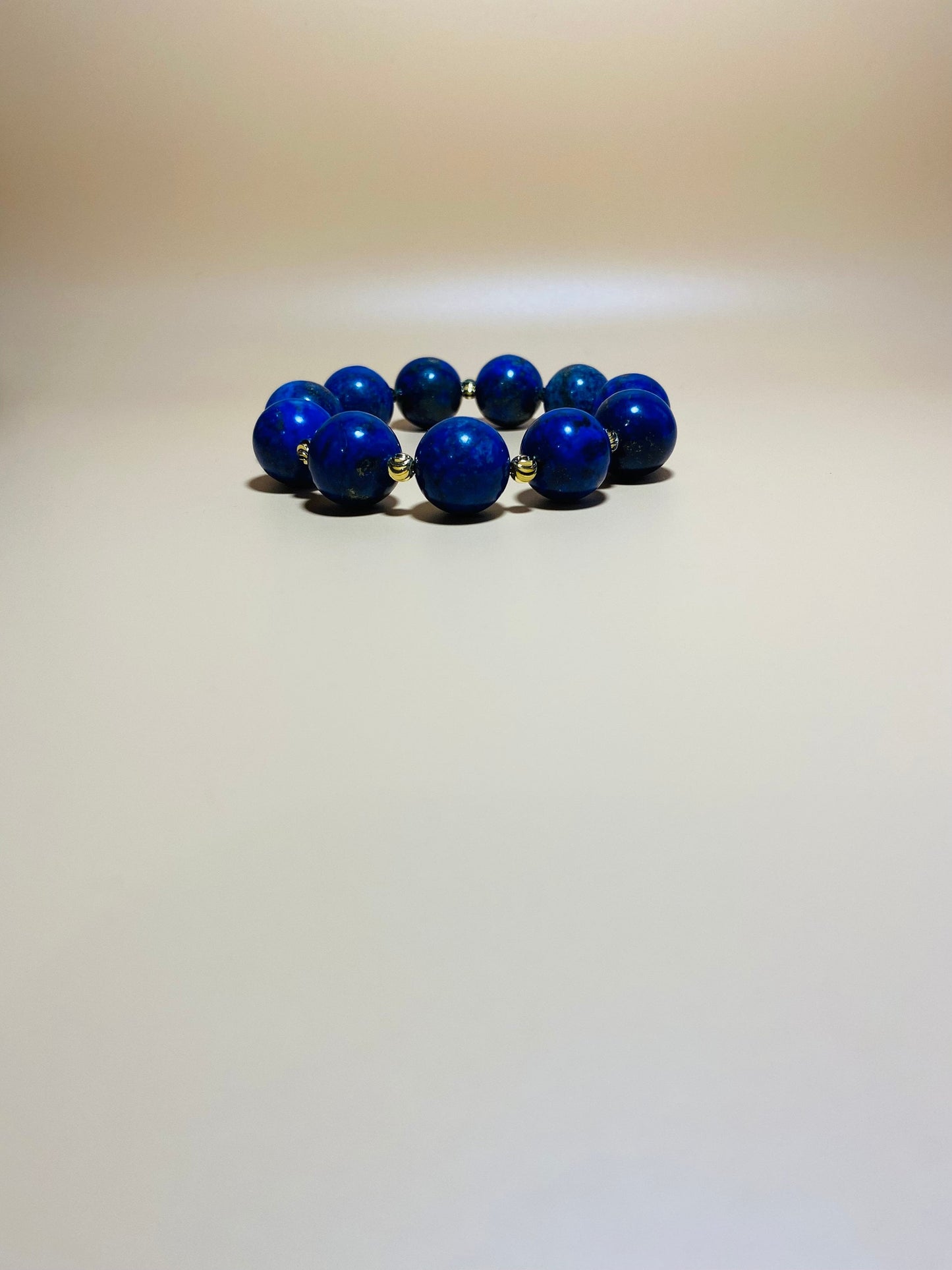 16mm Lapis Lazuli Bracelet with Gold Spacers