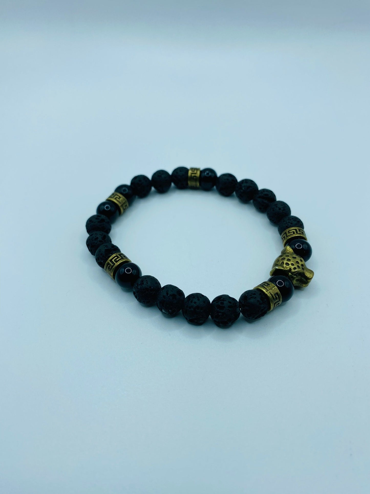 Black Onyx Lava Rock Bracelet with Bronze Leopard Charm