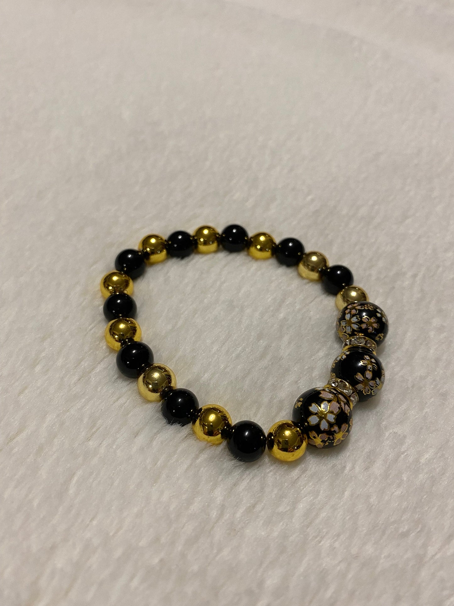 Handmade Floral Painted Glass Bead Bracelet: Onyx & 18k Gold Hematite