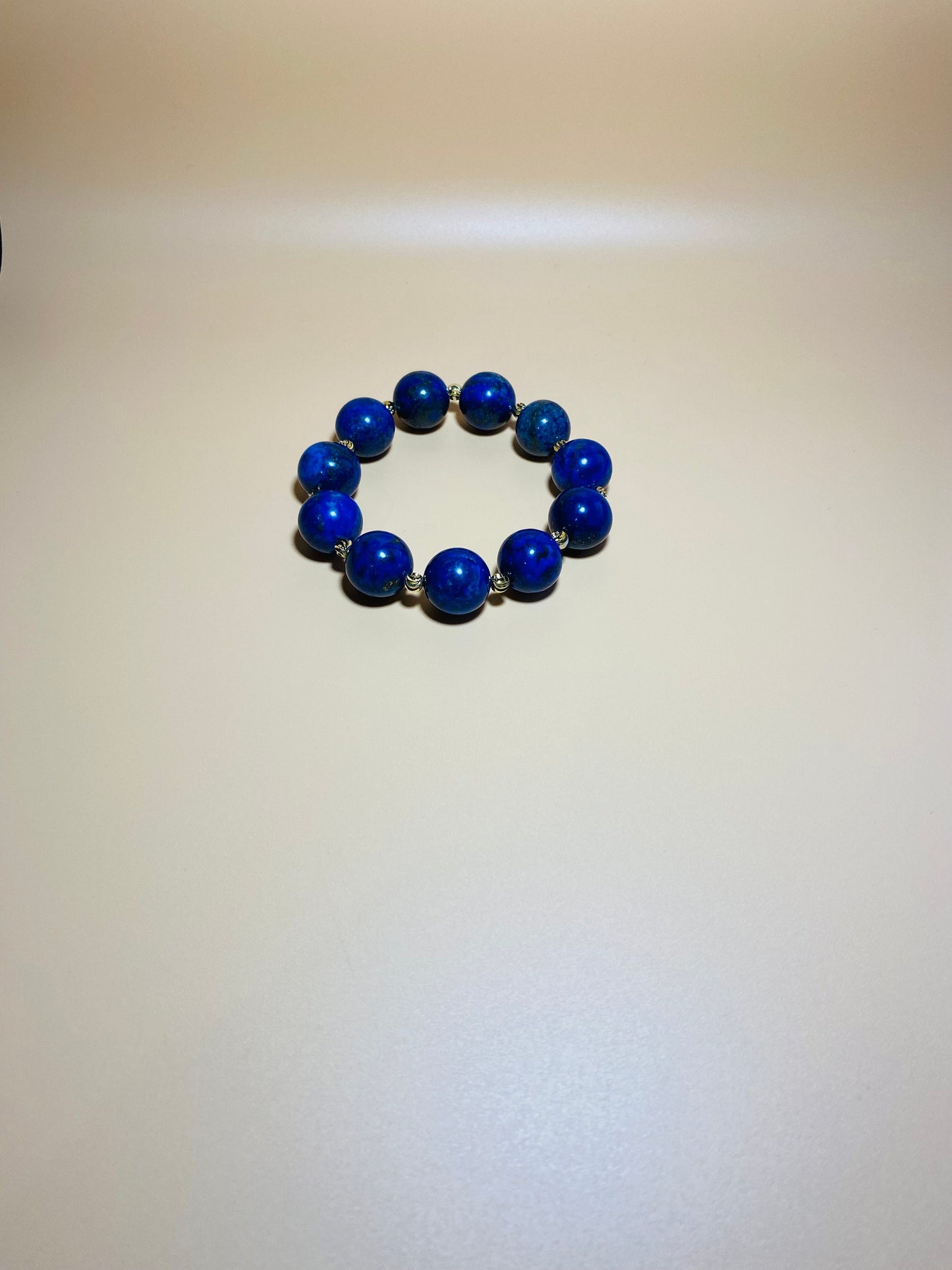 16mm Lapis Lazuli Bracelet with Gold Spacers