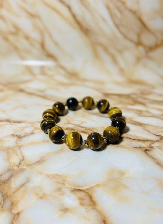 Tigers Eye Gemstone Bracelet: 16mm Beads with Gold Spacers