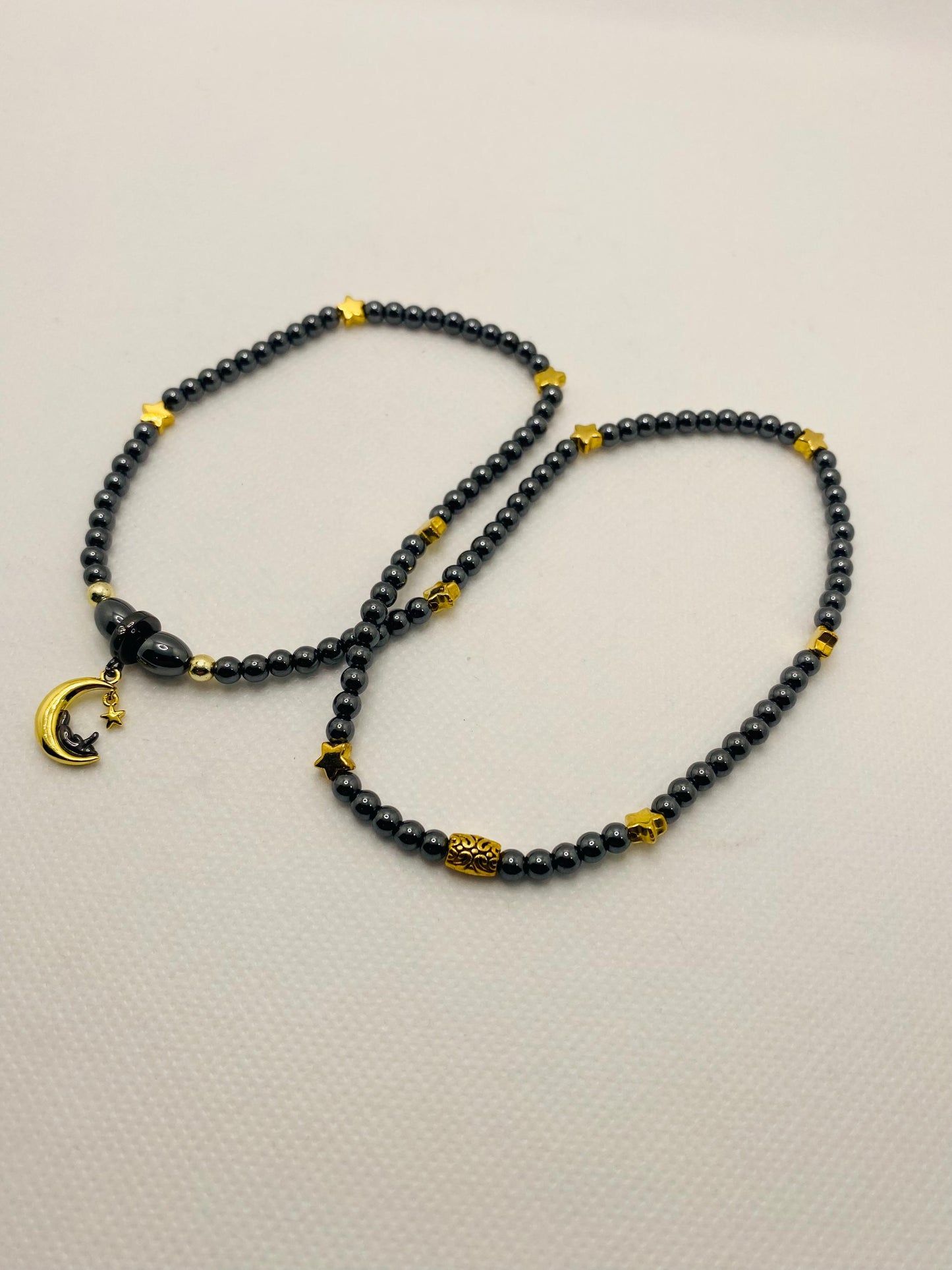 Celestial Hematite Necklace: Gold Star, Moon & Cat Charm