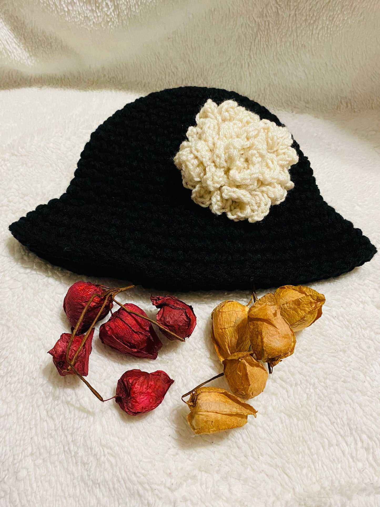 Black Crochet Bucket Hat: White Flower Accent, Handmade Acrylic