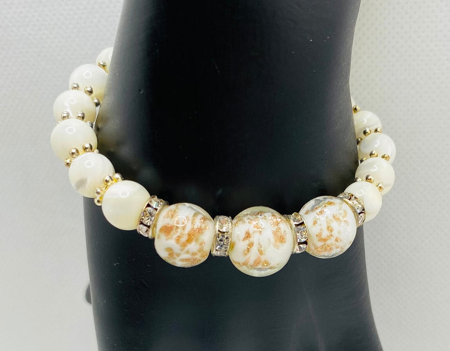 Handmade Mother of Pearl Bracelet: Lampwork Glass Beads, Silver Snowflakes