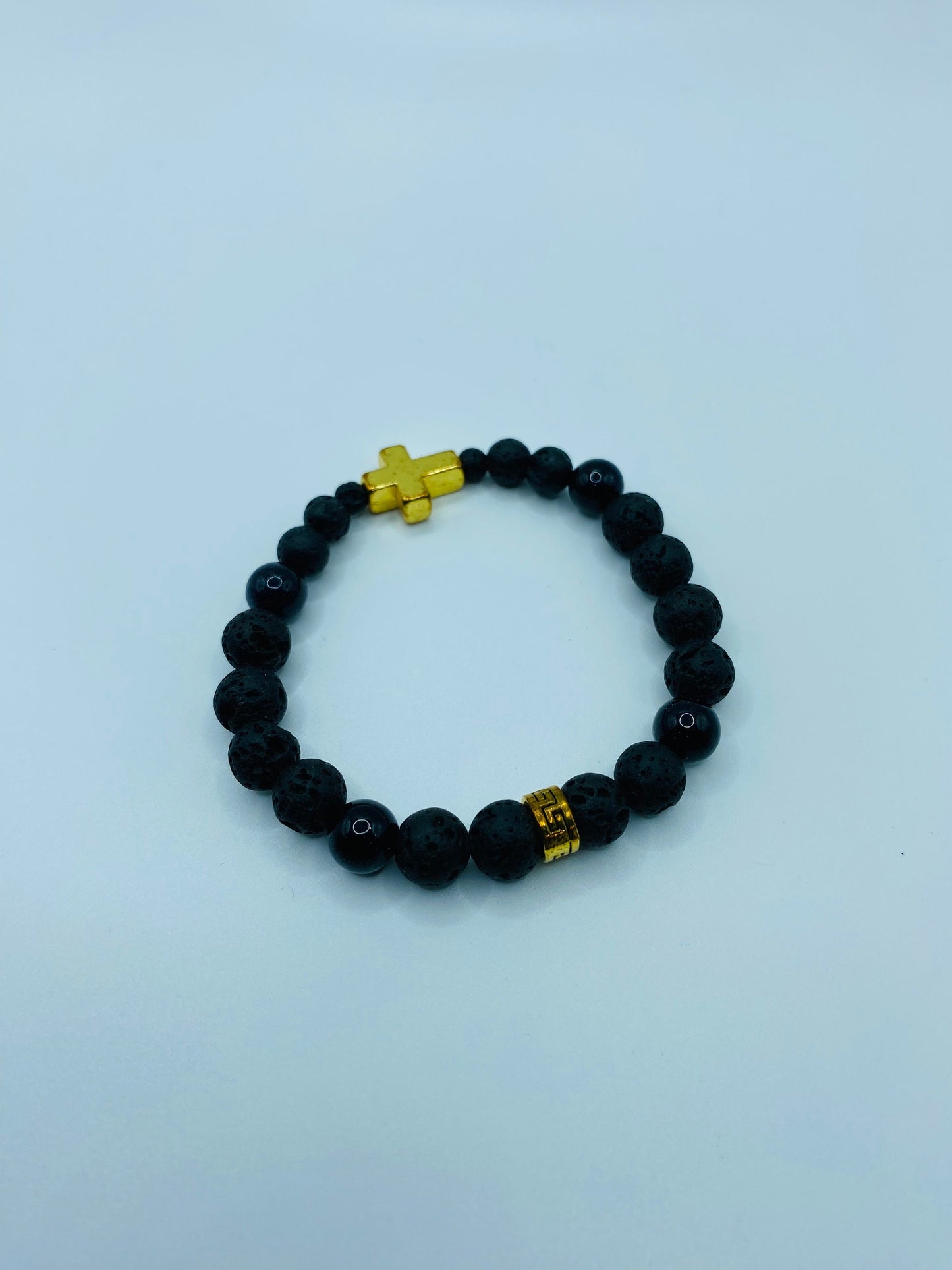 Gold Cross Lava Rock Bracelet: Black Onyx Gemstone Beads
