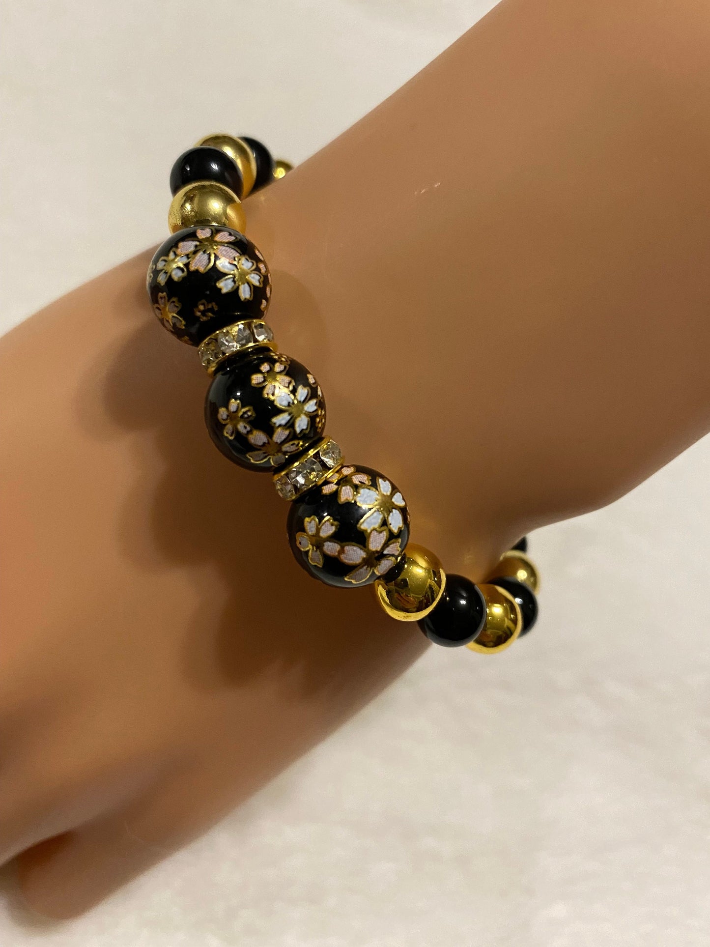 Handmade Floral Painted Glass Bead Bracelet: Onyx & 18k Gold Hematite