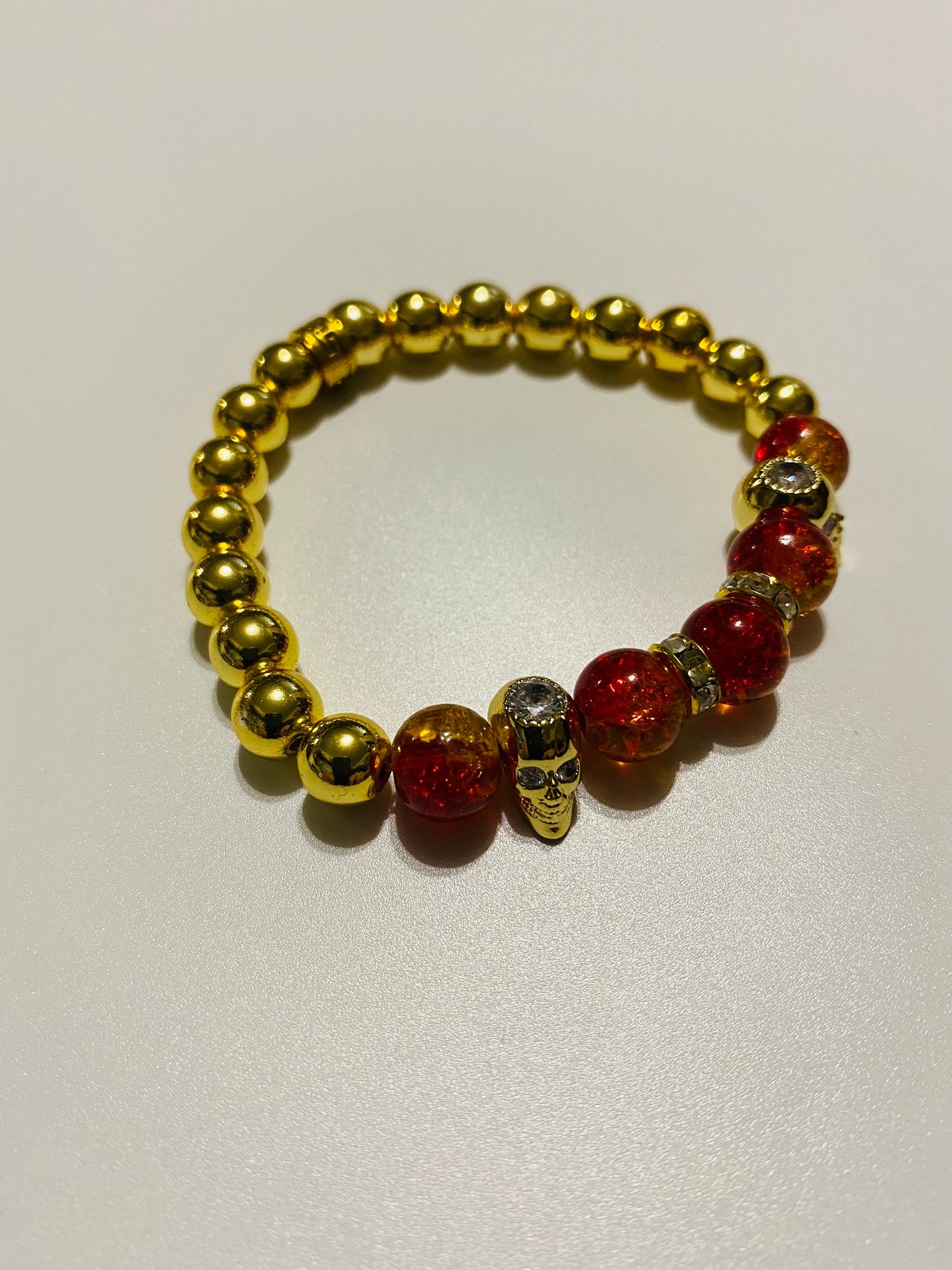 Men's Gold Hematite Bracelet: Red Crystal, CZ Skull Beads