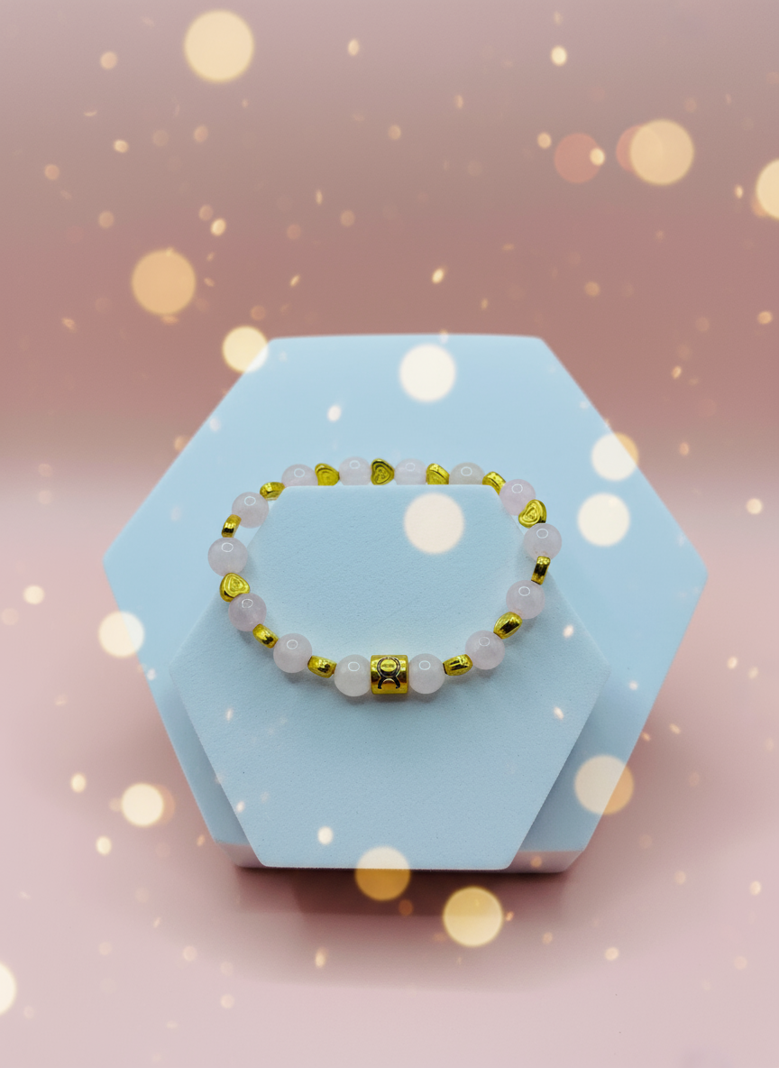 Background for Rose Quartz Bracelet with 18K Gold Heart & Taurus Zodiac Charm