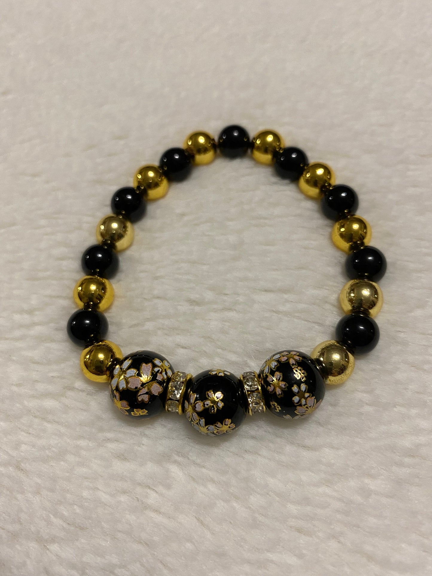 Handmade Floral Painted Glass Bead Bracelet: Onyx & 18k Gold Hematite