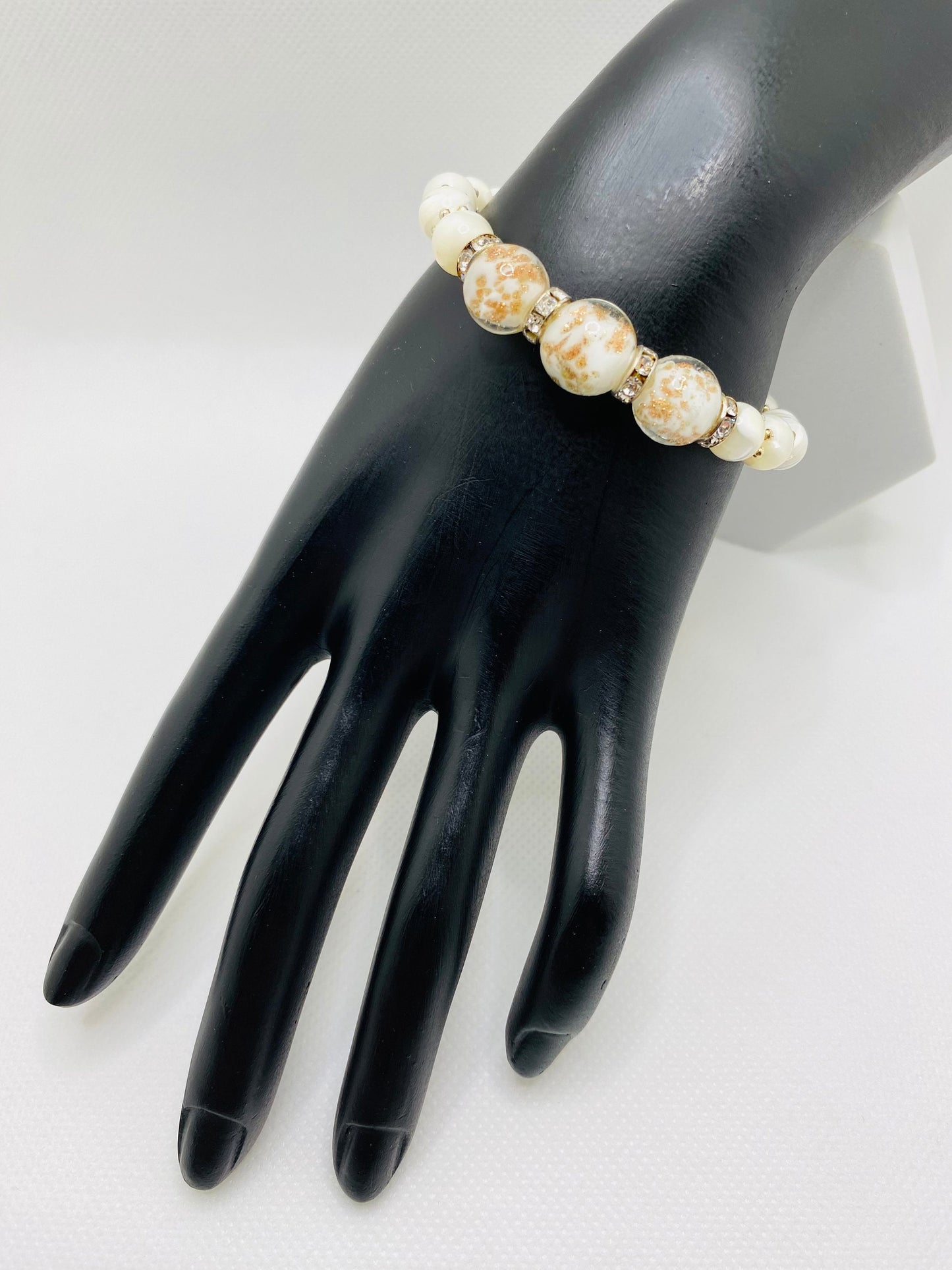 Handmade Mother of Pearl Bracelet: Lampwork Glass Beads, Silver Snowflakes