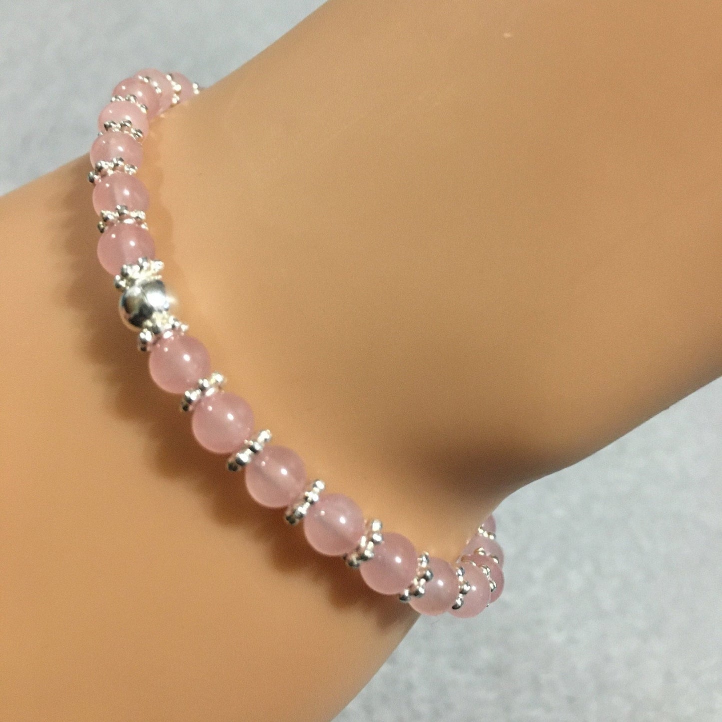 Rose Quartz Bracelet: Silver Snowflakes & Hematite Beads