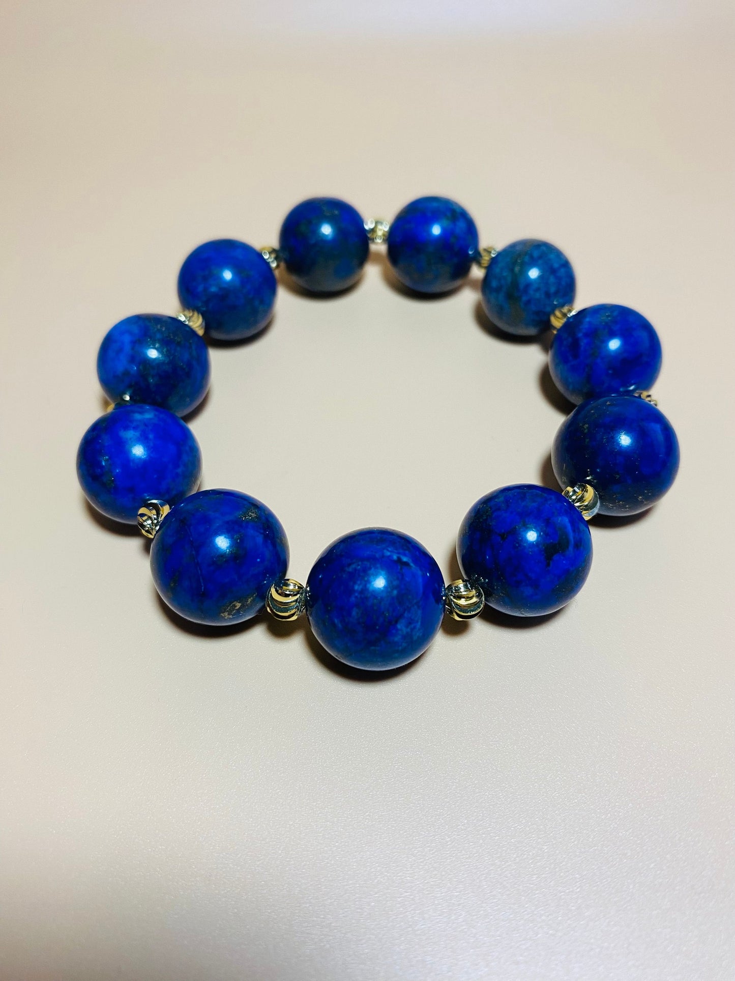 16mm Lapis Lazuli Bracelet with Gold Spacers
