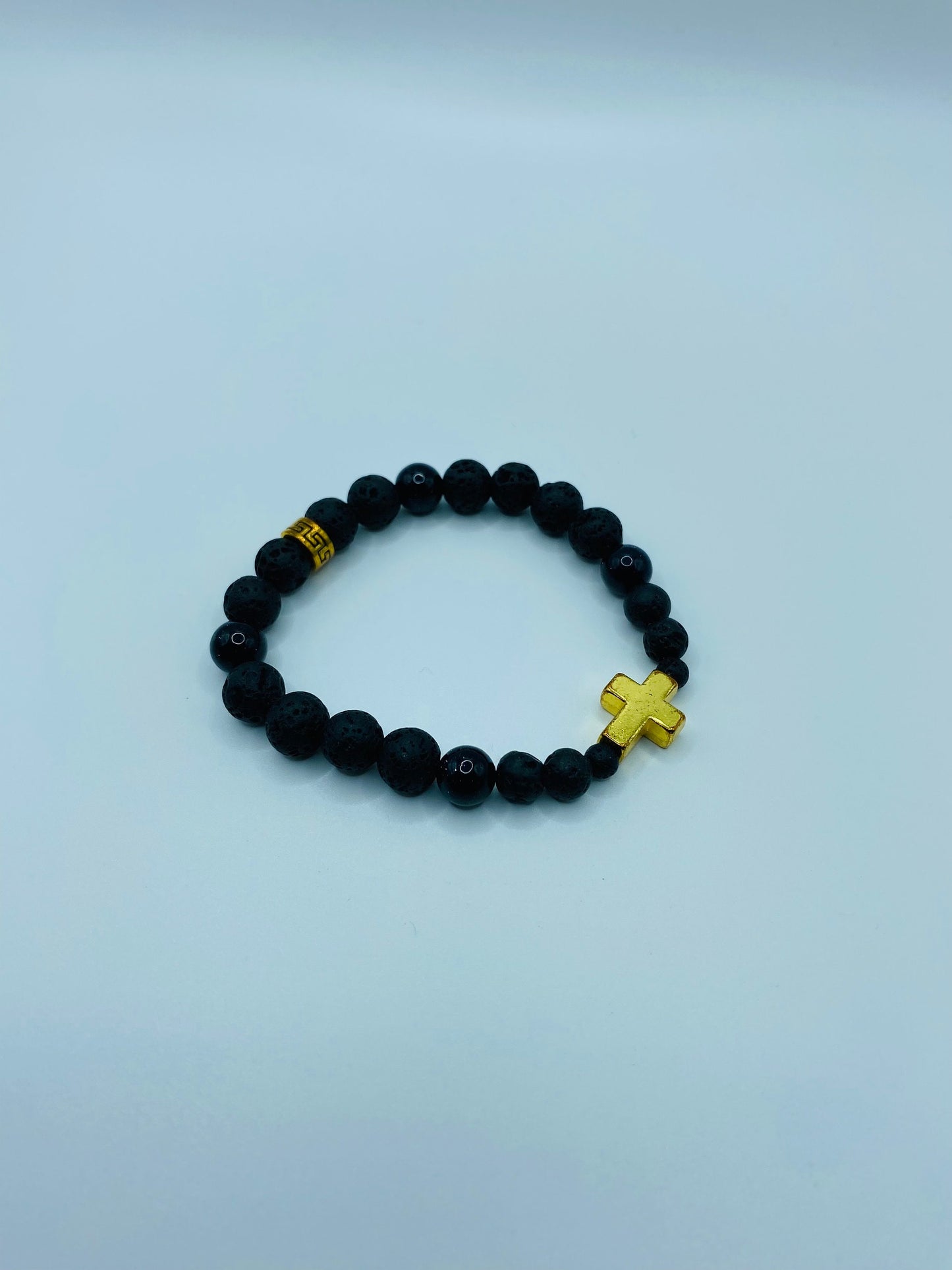 Gold Cross Lava Rock Bracelet: Black Onyx Gemstone Beads