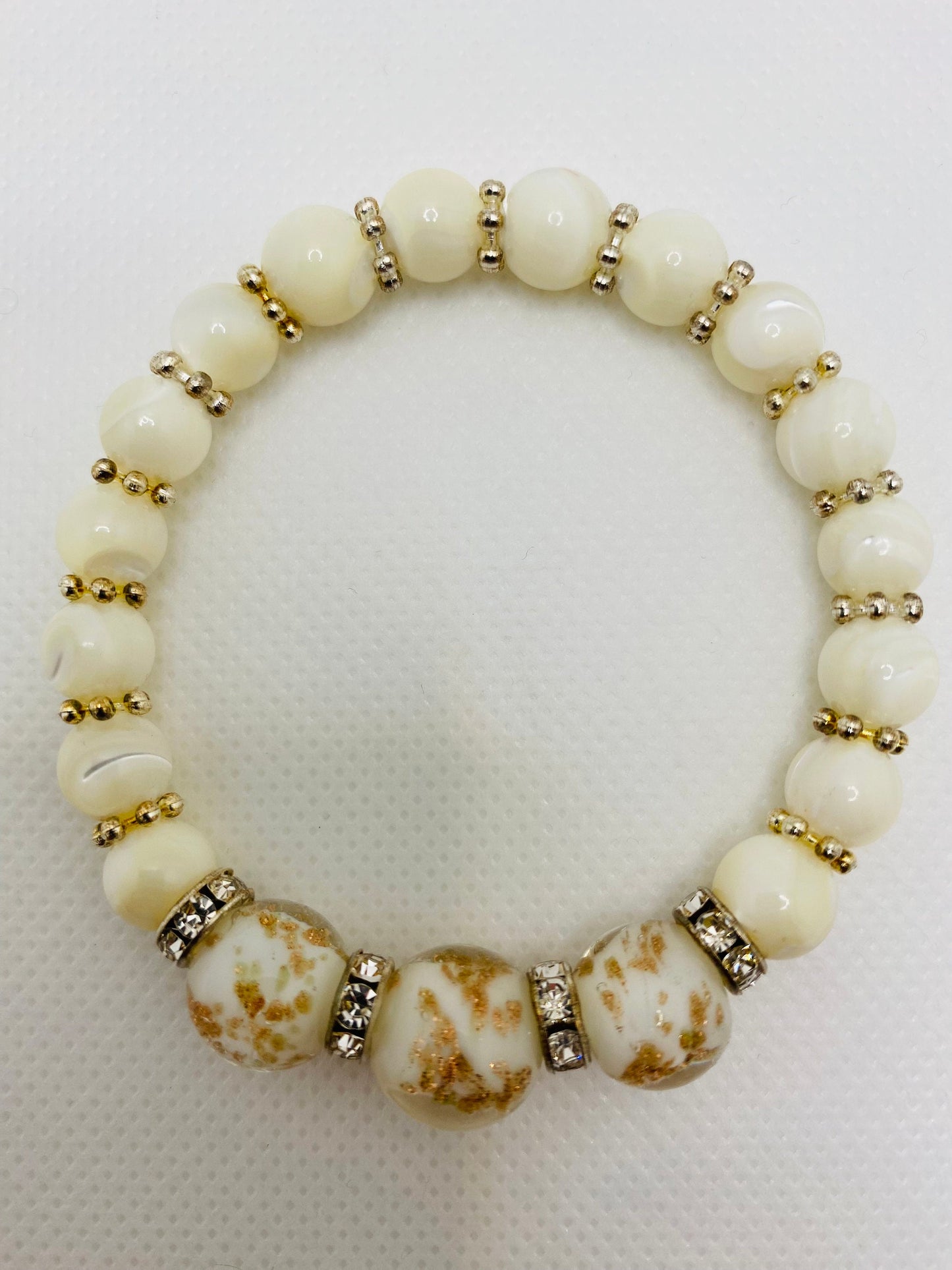 Handmade Mother of Pearl Bracelet: Lampwork Glass Beads, Silver Snowflakes