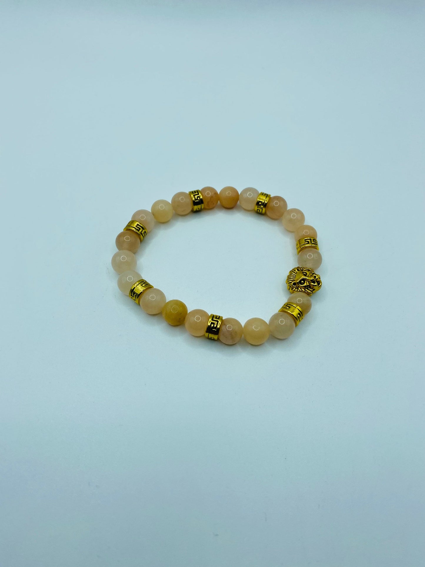 Pink Jade Lion Bracelet: Gold Tibetan Charm Bracelet