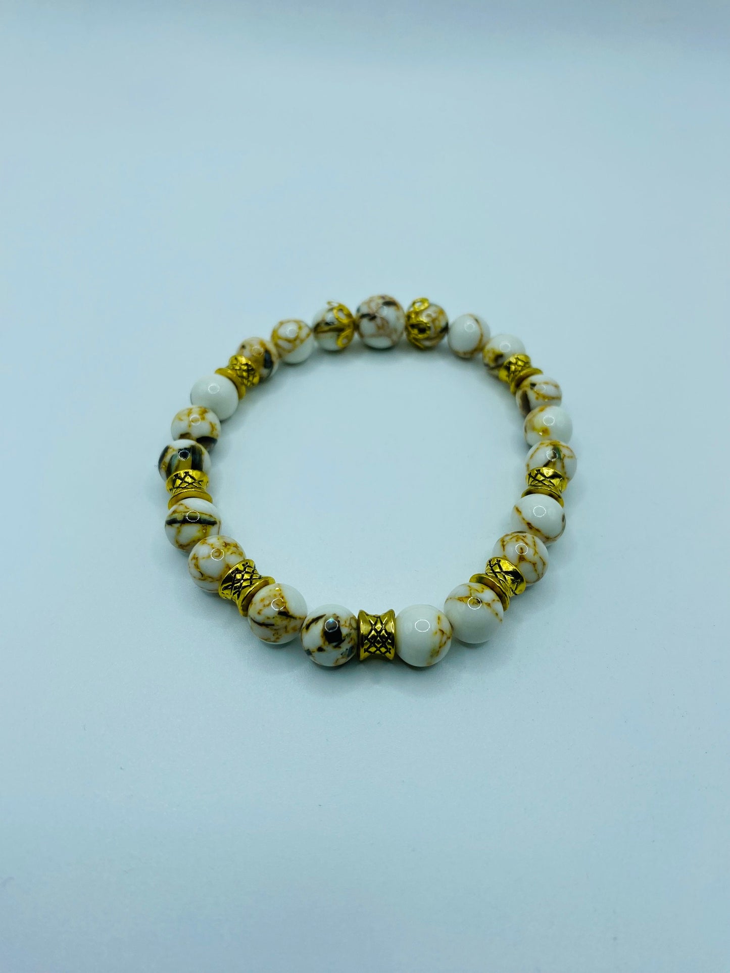 Handmade White Turquoise Bracelet: Tibetan Gold Spacers