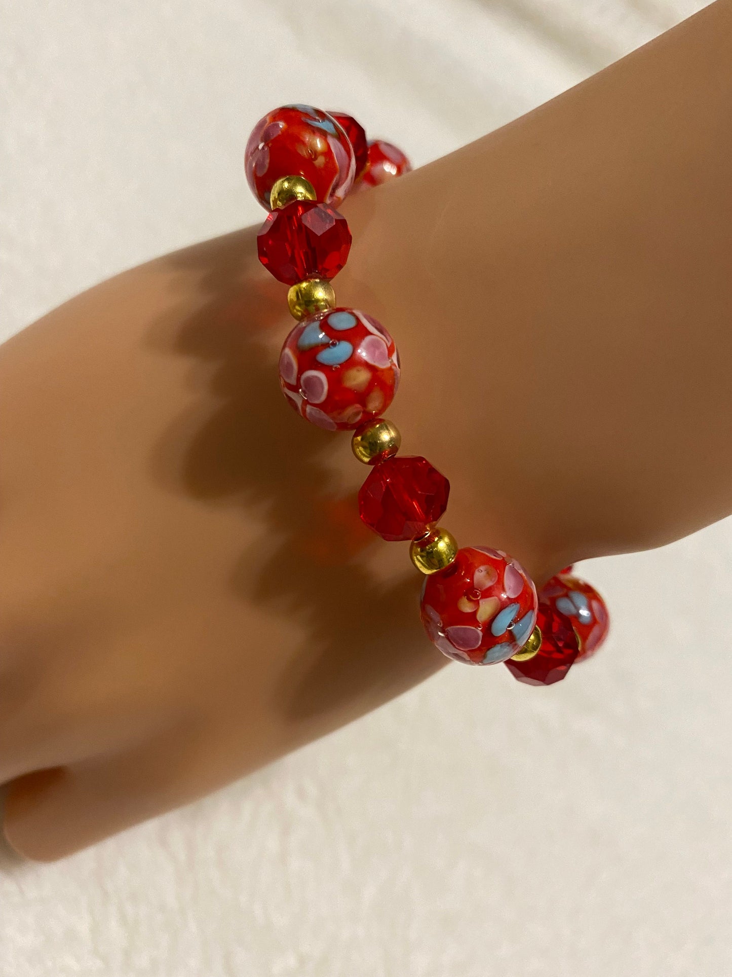 Red Floral Lampwork Glass Bead Bracelet: 18k Gold Hematite Accents