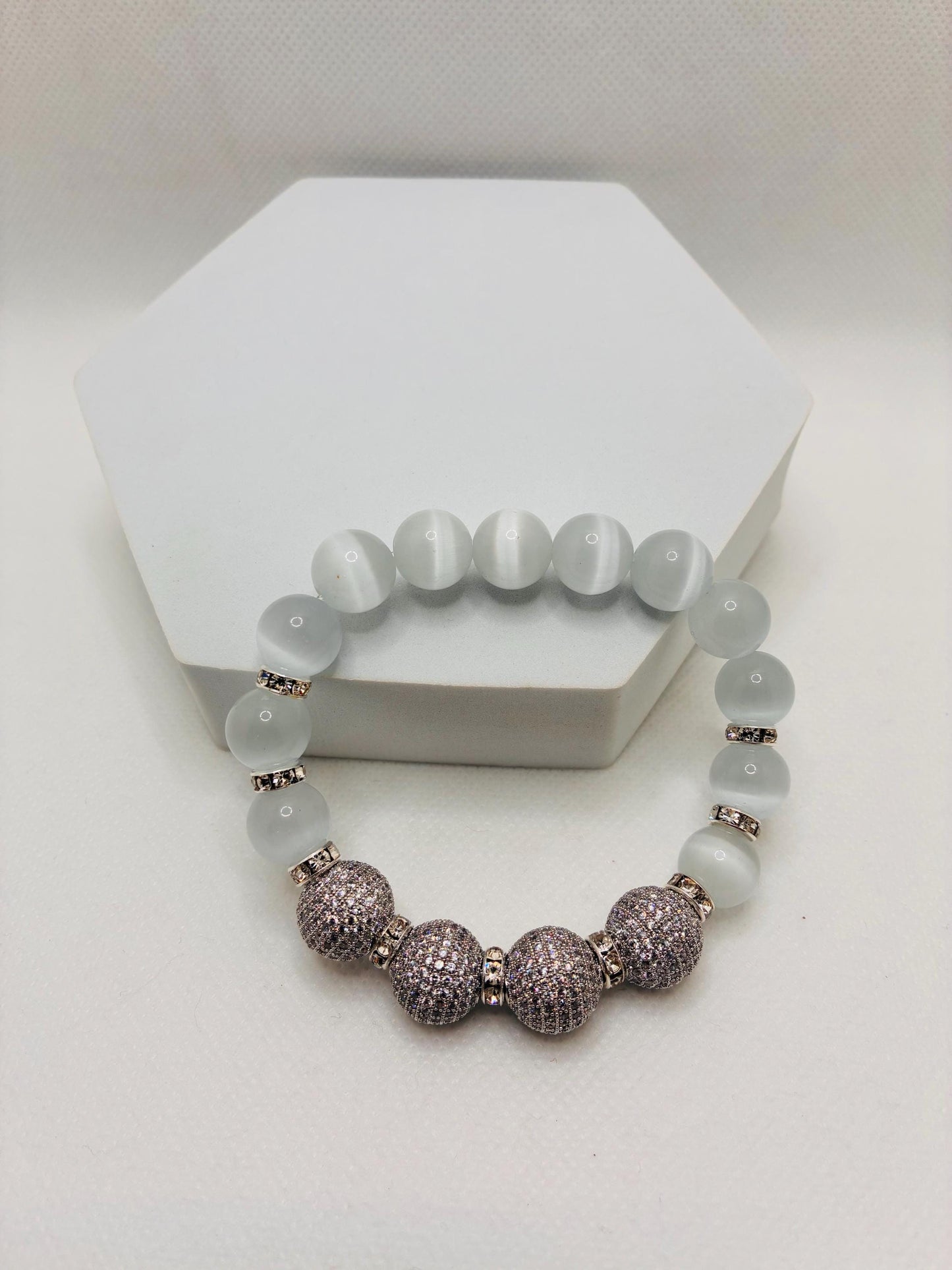 White Cats Eye Beaded Bracelet with Silver Cubic Zirconia Beads: Silverplated rhinestone rondelles